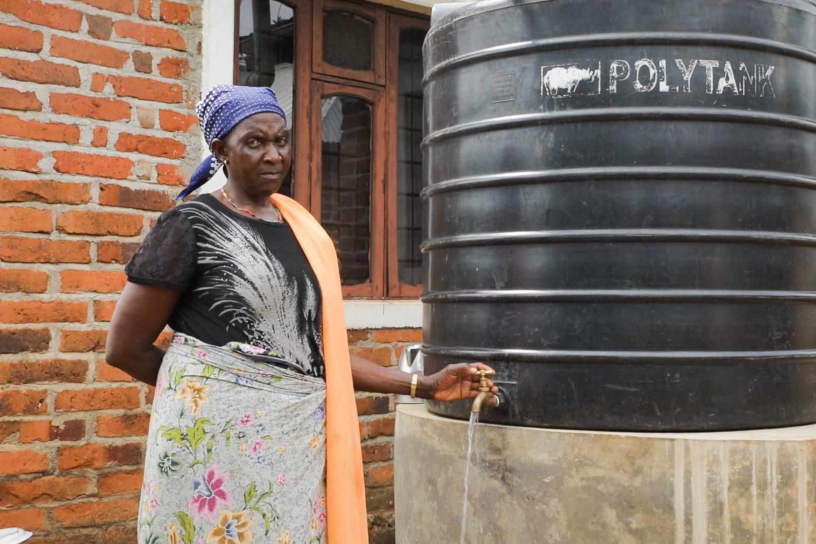 Pastor Tukupasia Bugali domestic water harvesting tank